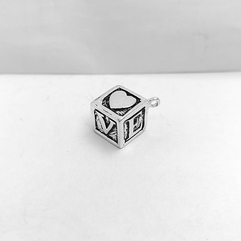 Silver Overlay Over Copper heart cube pendant handcrafted in India with antique oxidized finish.