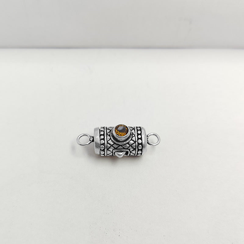 Silver Overlay Over Copper clasp with round amber-colored stone handcrafted in India with vintage oxidized detailing.