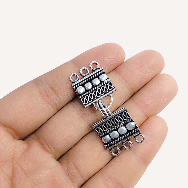 Handcrafted silver overlay over copper multi-strand box clasp from India with decorative bead and wire design