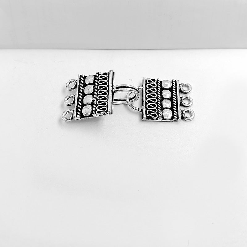 Handcrafted silver overlay over copper multi-strand box clasp from India with decorative bead and wire design
