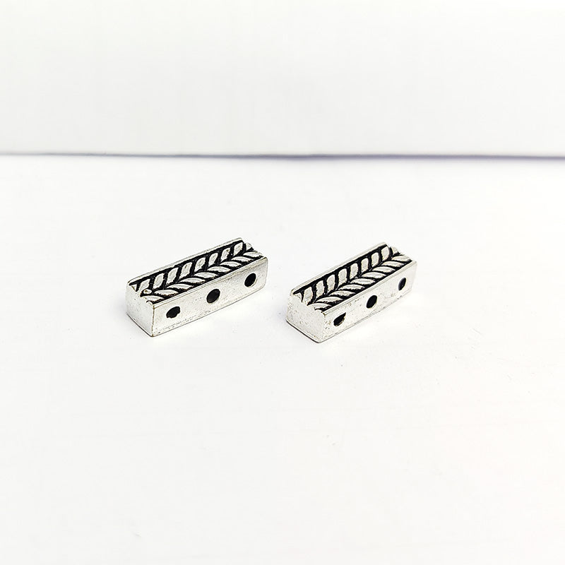 Handcrafted silver overlay over copper chevron spacer bar with three holes from India for jewelry making