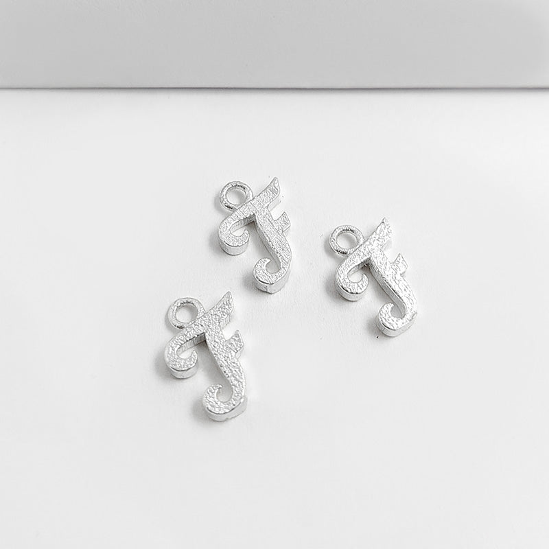 Silver overlay over copper alphabet F Charm with script design, handcrafted in India for personalized jewelry
