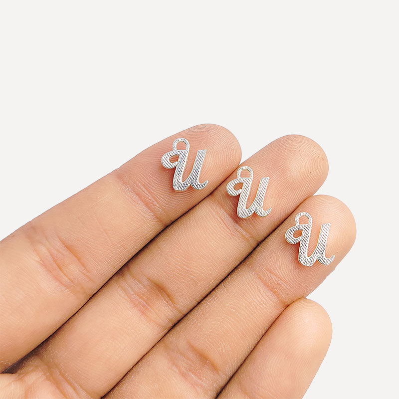 Handcrafted Silver Overlay Over Copper alphabet “U” charm from India with polished textured silver finish for handmade jewelry.