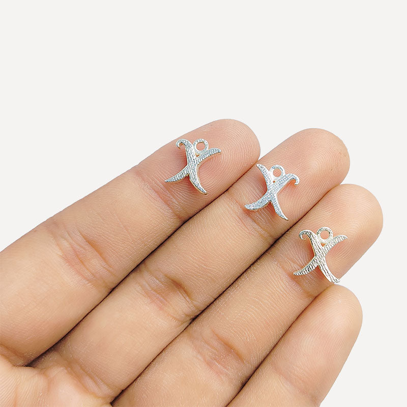 Handcrafted Silver Overlay Over Copper alphabet “X” charm from India with polished textured finish for handmade jewelry.