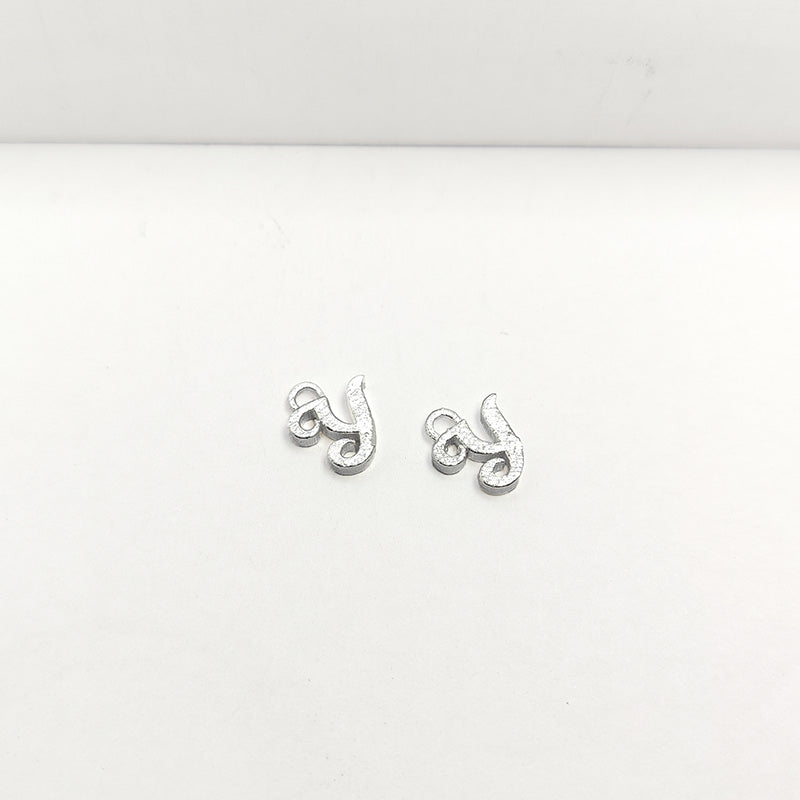 Handcrafted Silver Overlay Over Copper alphabet “Y” charm from India with polished silver finish for handmade jewelry projects.