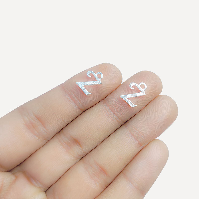 Handcrafted Silver Overlay Over Copper alphabet “Z” charm from India with textured silver finish for handmade jewelry.