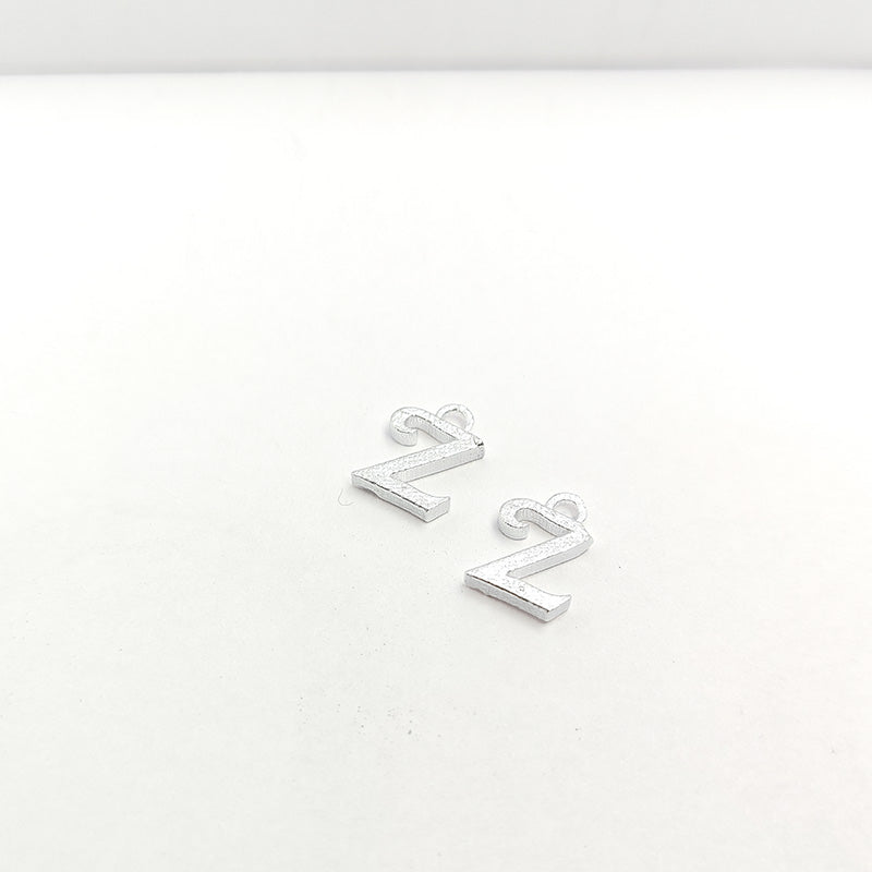 Handcrafted Silver Overlay Over Copper alphabet “Z” charm from India with textured silver finish for handmade jewelry.
