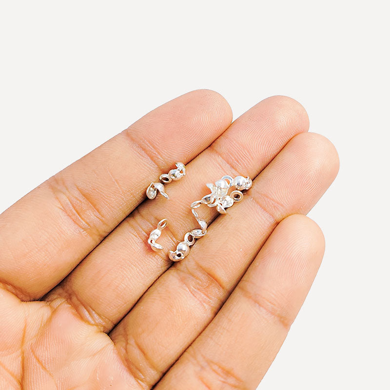 Handcrafted Silver Overlay Over Copper crimp shell from India with polished finish for handmade jewelry designs.