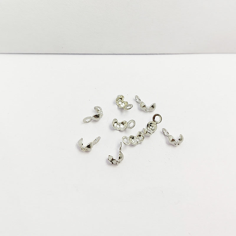 Handcrafted Silver Overlay Over Copper crimp shell from India with polished finish for handmade jewelry designs.