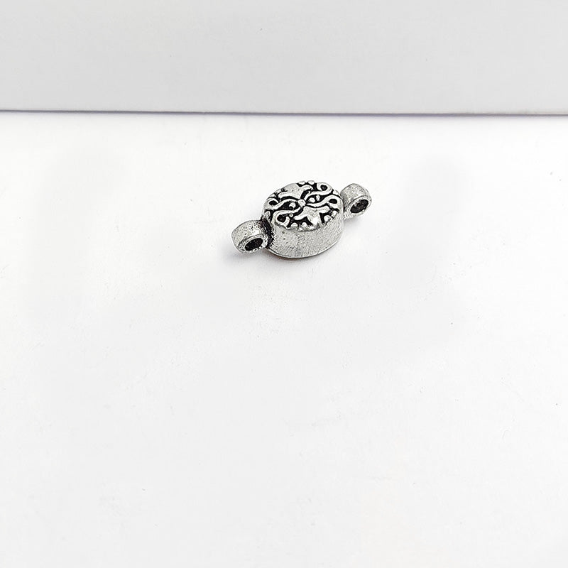 Handcrafted Silver Overlay Over Copper oval floral magnetic clasp from India with oxidized silver finish for handmade jewelry designs.