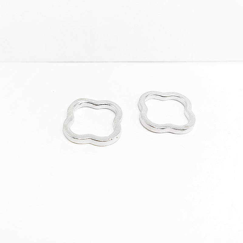 Handcrafted Silver Overlay Over Copper clover connector link from India with polished finish for handmade jewelry.