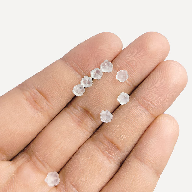 India handcrafted plastic earnut earring back holder featuring frosted floral-shaped transparent jewelry support