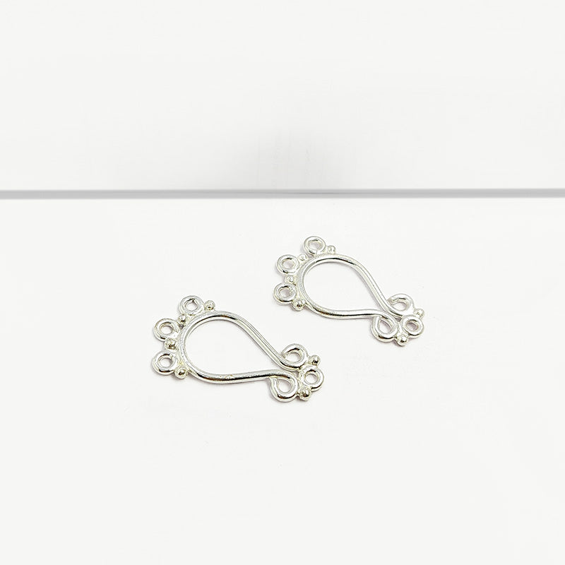 Handcrafted Silver Overlay Decorative Teardrop Connector from India with polished filigree design
