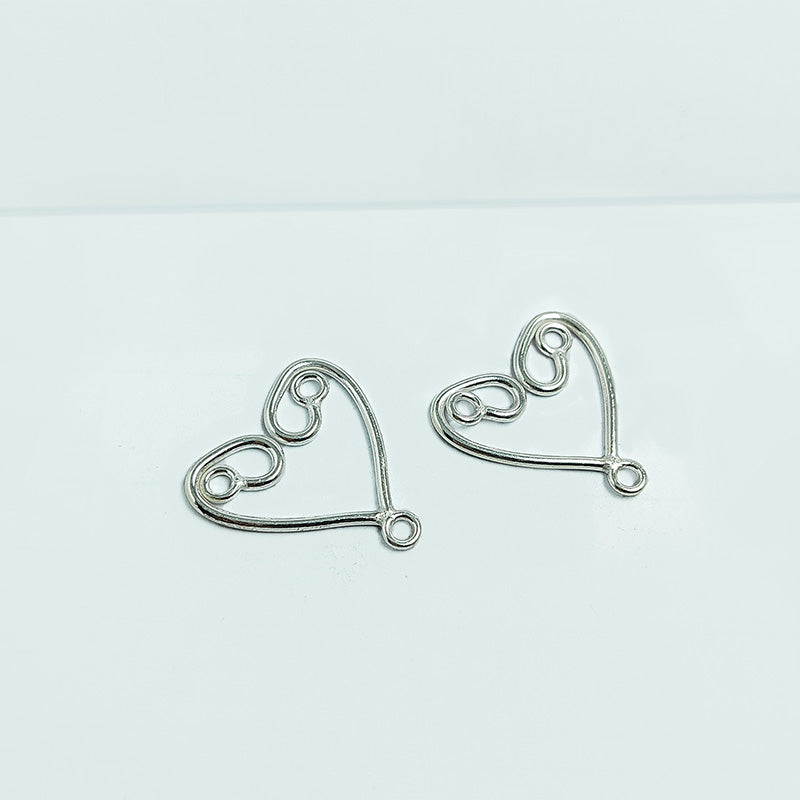 Handcrafted Silver Overlay Double Heart Earwire from India with polished silver overlay finish