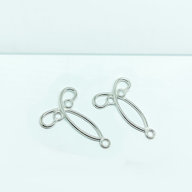 Handcrafted Silver Overlay Twisted Leaf Earwire from India with polished silver overlay finish