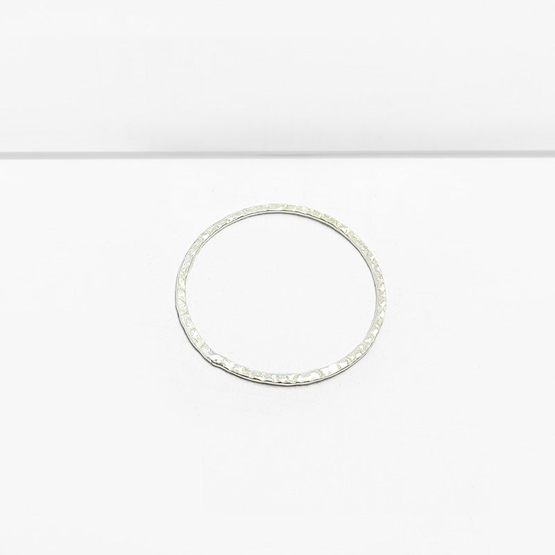 Handcrafted Silver Overlay Hammered Round Connector from India with polished silver overlay finish
