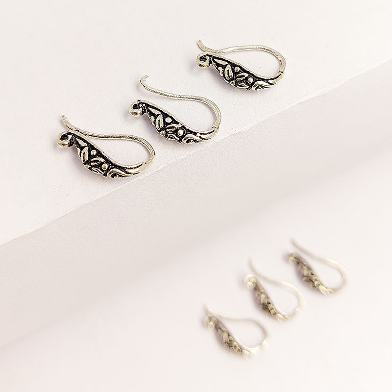 Handcrafted Silver Overlay Floral Earwire from India with polished silver overlay finish