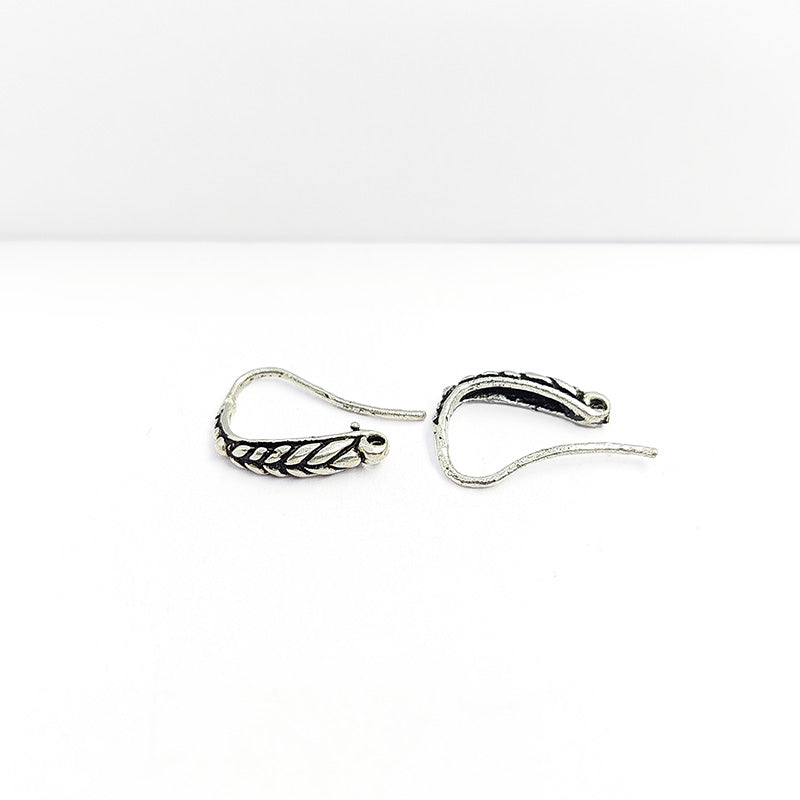 Handcrafted Silver Overlay Leaf Earwire from India with polished silver overlay finish
