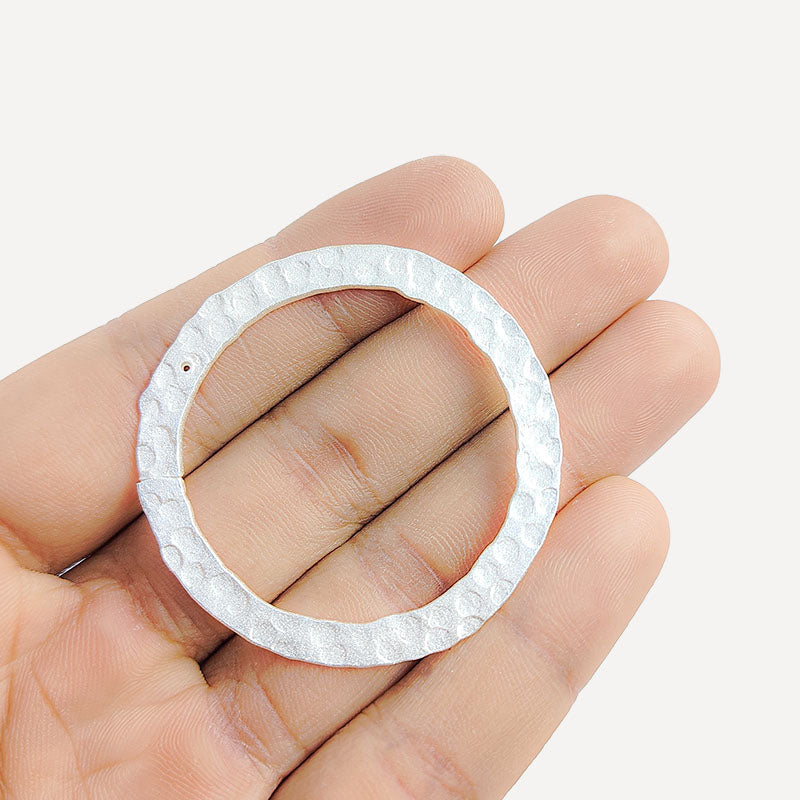 Handcrafted Silver Overlay Hammered Round Connector from India with polished textured finish