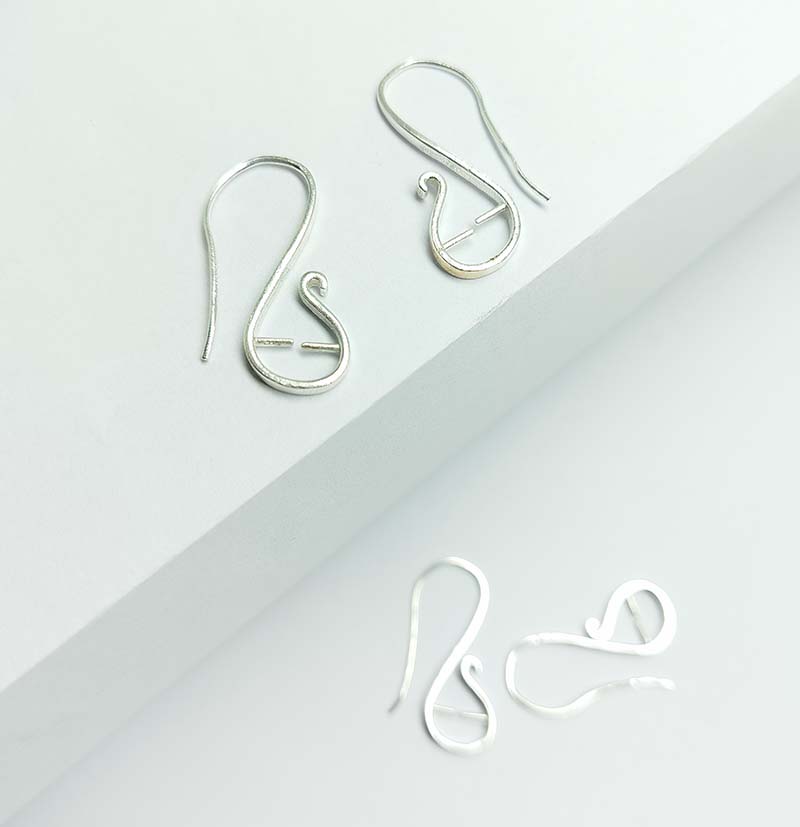 Handcrafted Silver Overlay Scroll Hook Earwire from India with polished silver overlay finish