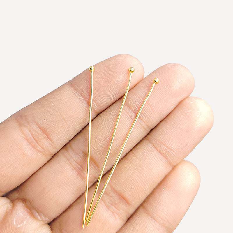 Elegant polished gold-overlay copper pin handcrafted in India with a rounded tip.