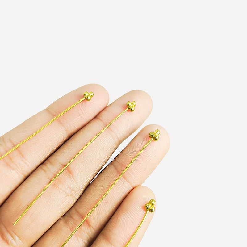 Elegant triple-bead gold-overlay copper head pin handcrafted in India.