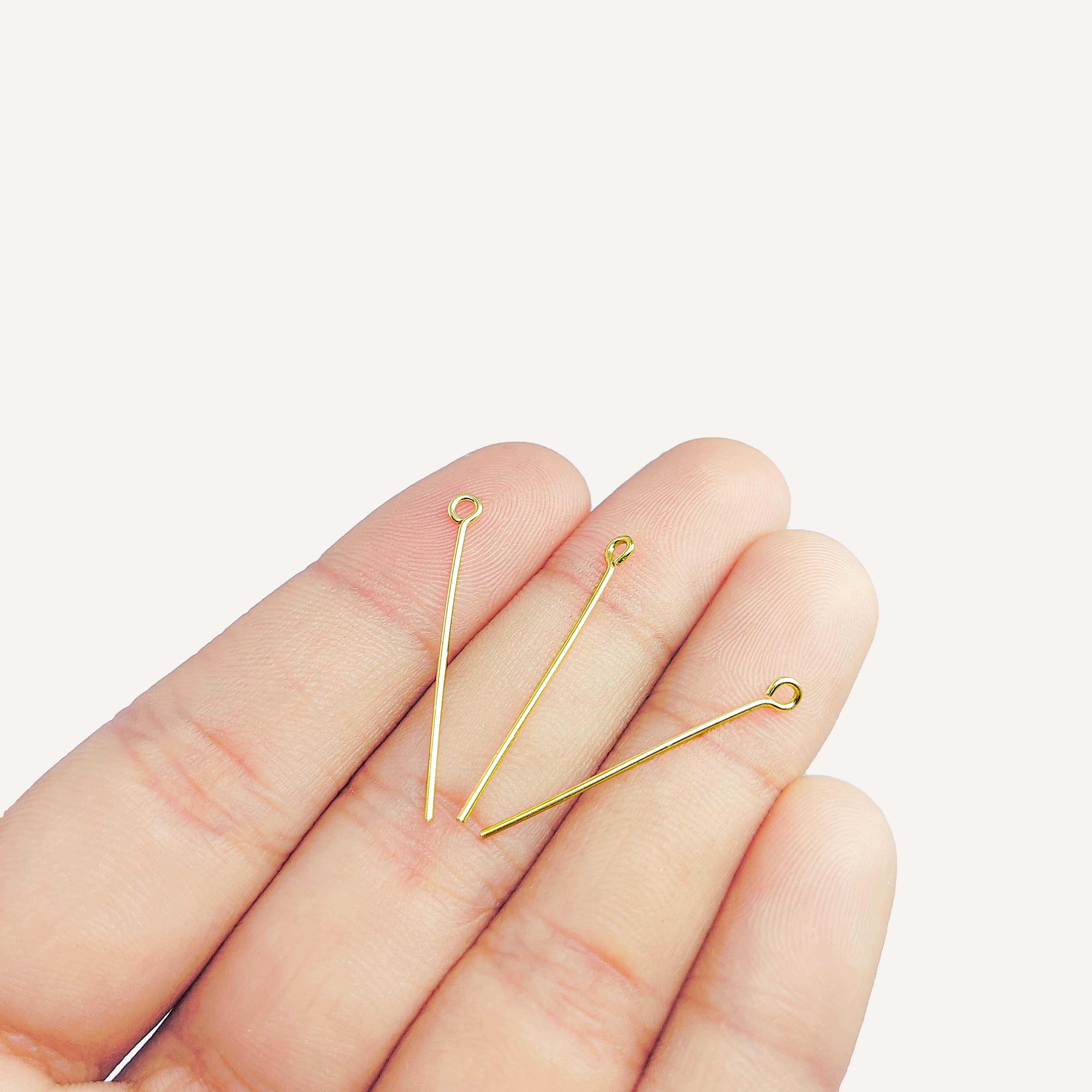Polished artisanal eye pin with 18K gold overlay handcrafted in India.