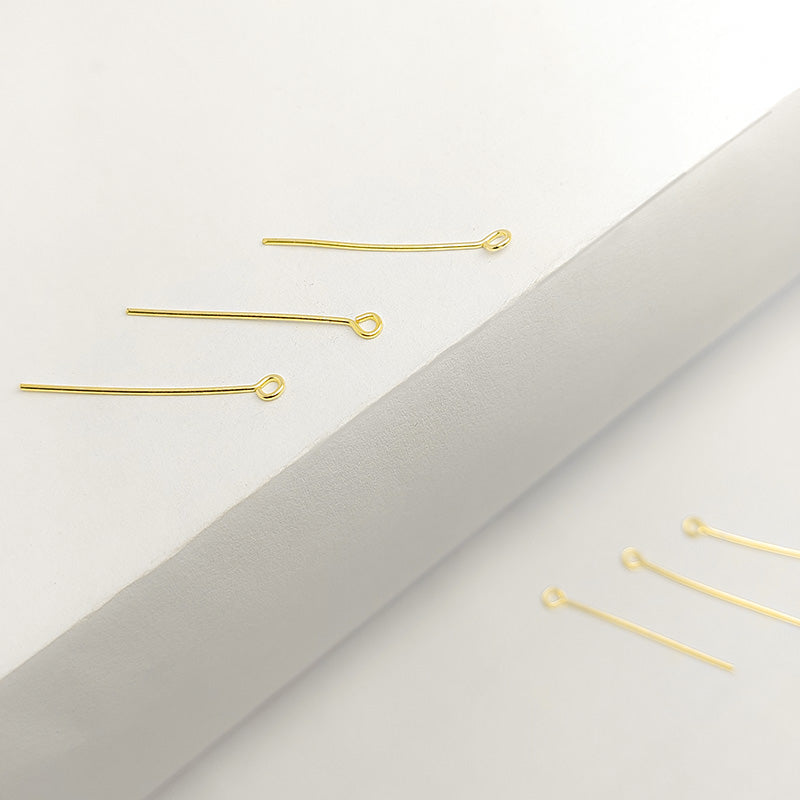 Polished artisanal eye pin with 18K gold overlay handcrafted in India.