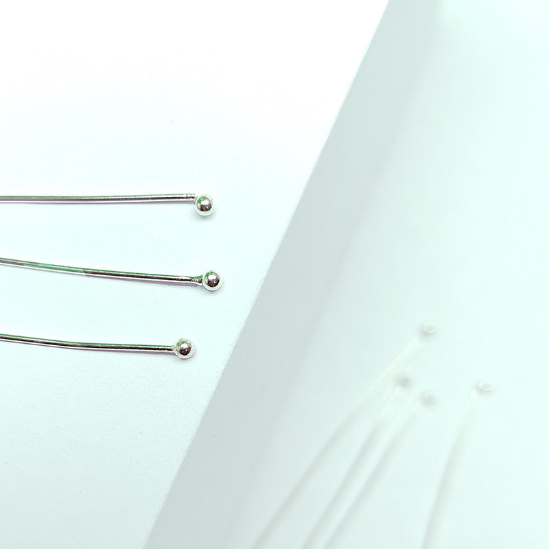 India handcrafted silver overlay over copper ball head pin for retail jewelry crafting.