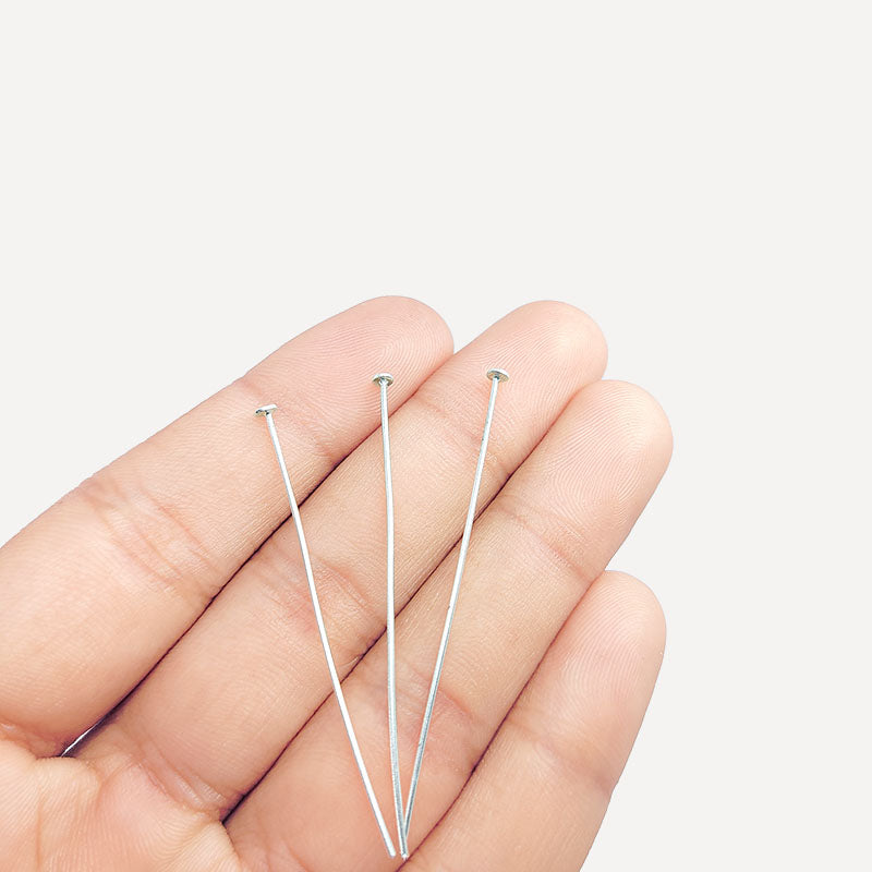 India handcrafted silver overlay over copper flat head pin for retail jewelry crafting.
