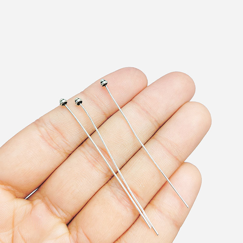Handcrafted silver overlay headpin from India with a three-ball decorative tip.