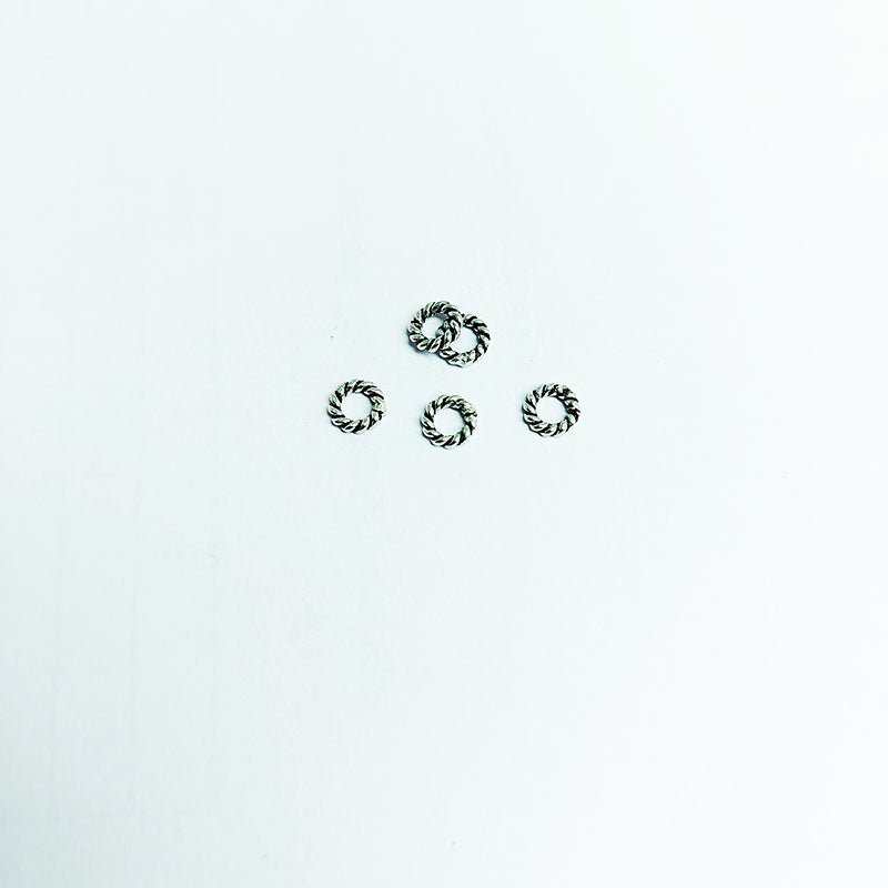 Elegant silver overlay twisted rope ring with oxidized finish, handcrafted in India, minimalist artisan jewelry.