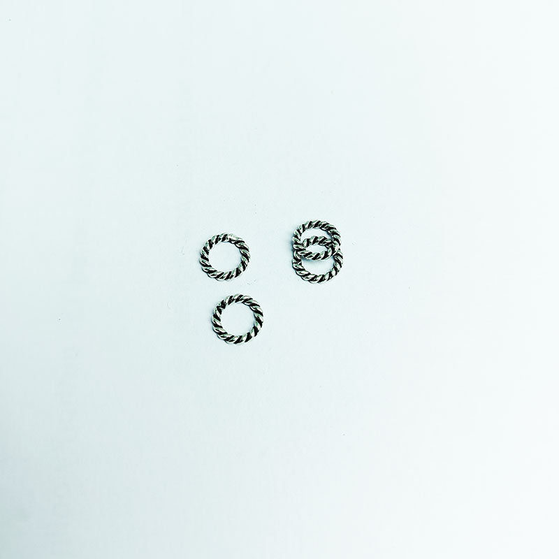 Elegant silver overlay twisted rope ring with oxidized finish, handcrafted in India, minimalist artisan jewelry.