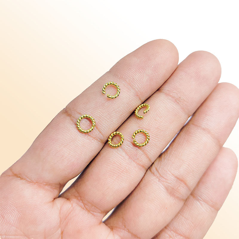 Elegant twisted jump ring in 18K gold overlay over copper, polished finish, handcrafted in India.