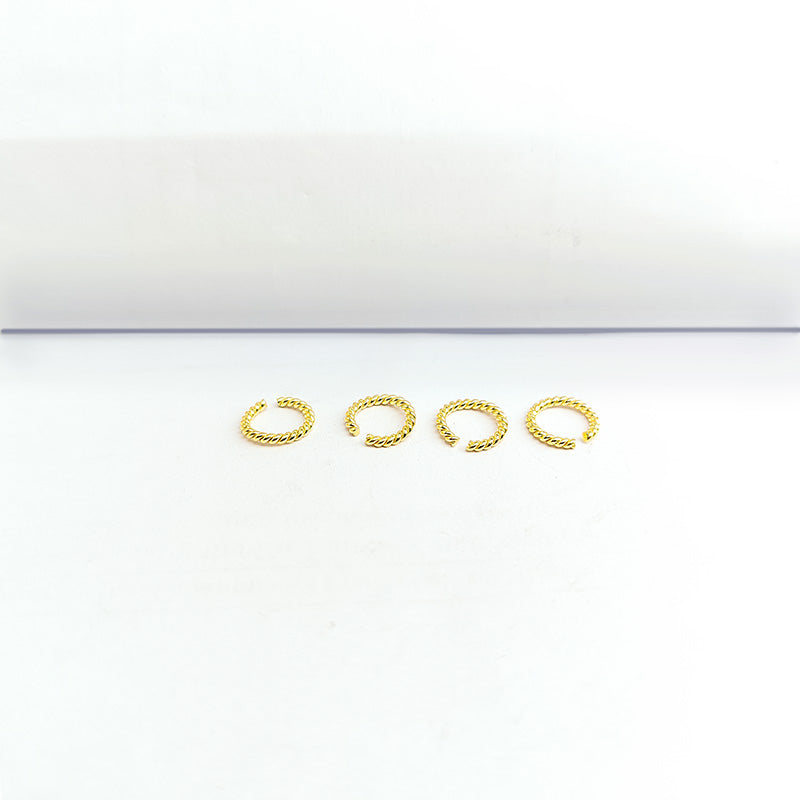 Elegant twisted jump ring in 18K gold overlay over copper, polished finish, handcrafted in India.