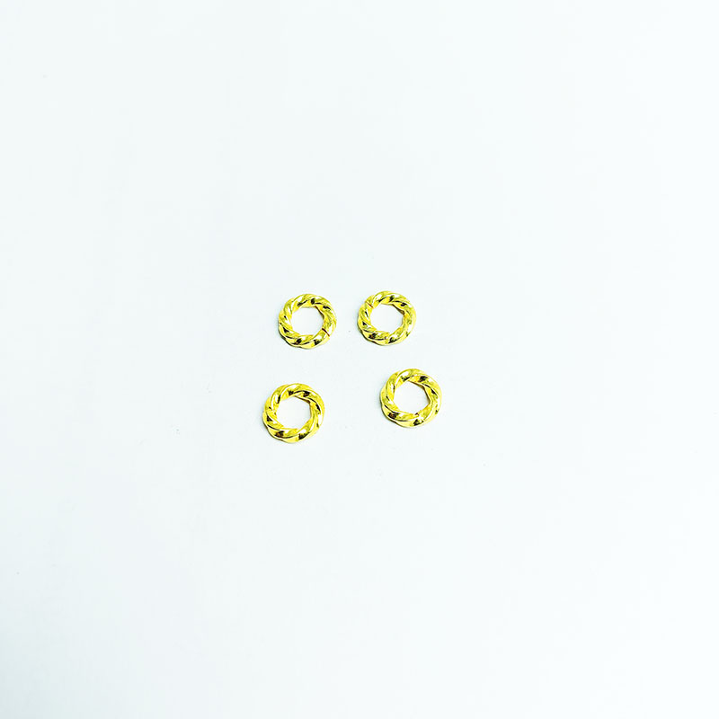 Elegant irregular twisted jump ring in 18K gold overlay over copper, polished finish, handcrafted in India.