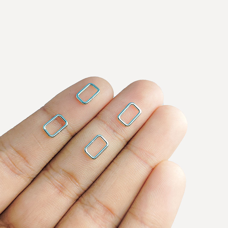 Luxury silver overlay rectangular open jump ring with polished finish, handcrafted in India for modern jewelry making.
