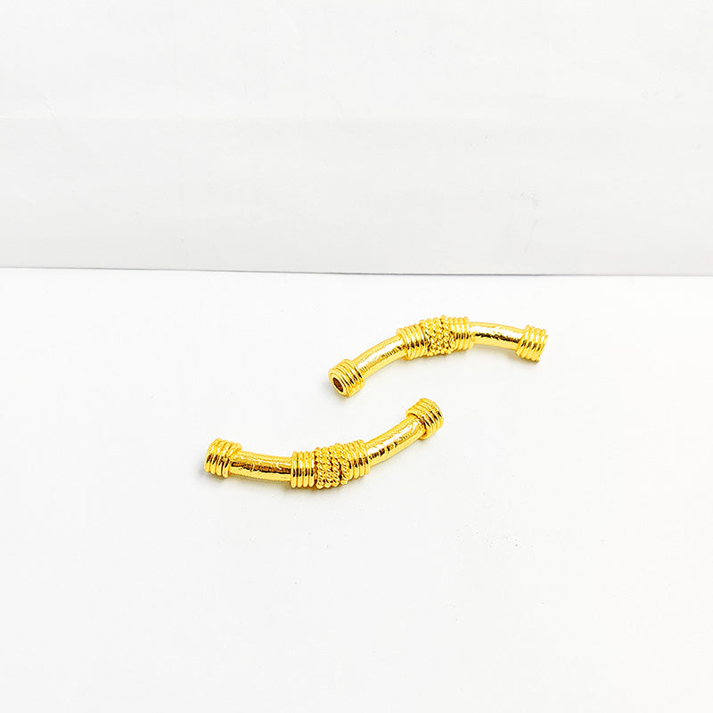 Handcrafted 18K Gold Overlay Tube Over Copper curved jewelry bead from India with polished finish