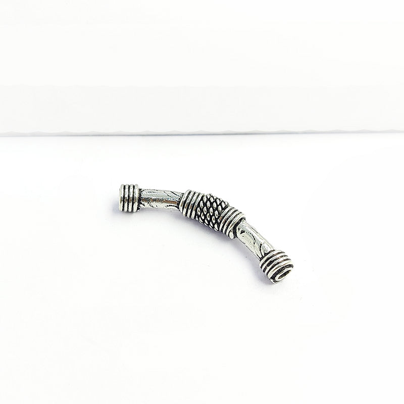 Handcrafted silver overlay tube bead from India with oxidized finish and rope detail for retail jewelry making