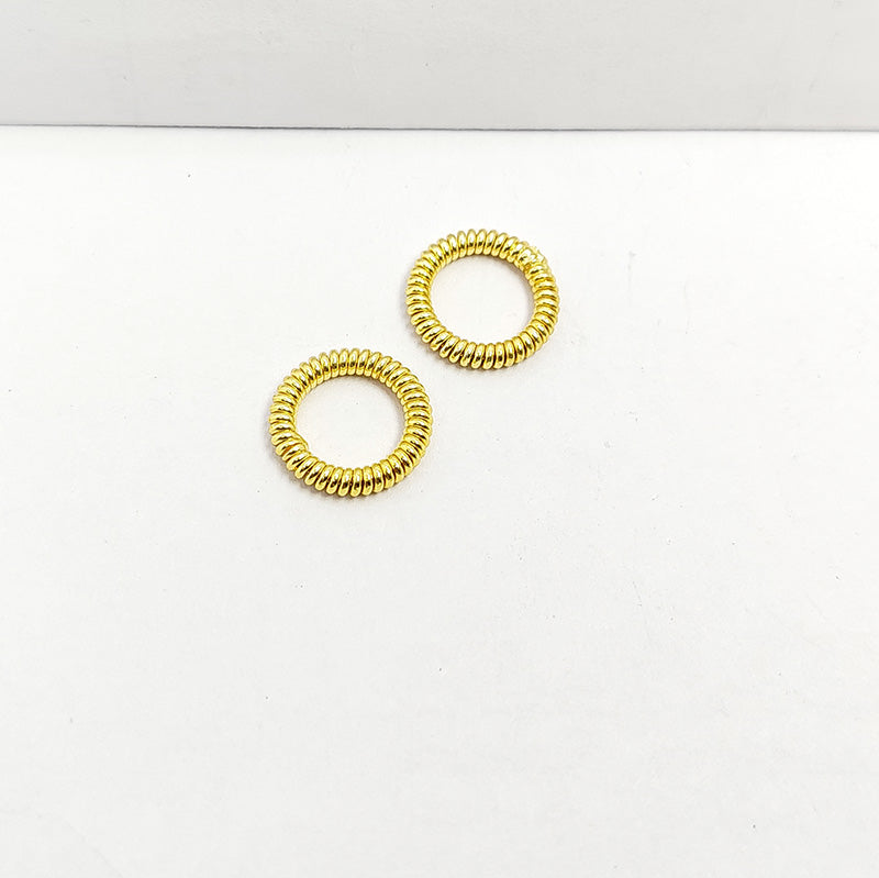 Elegant 18K Gold Overlay Copper coiled spring jewelry ring with tightly wound circular pattern and polished gold finish, handcrafted in India for DIY jewelry making and creative designs.