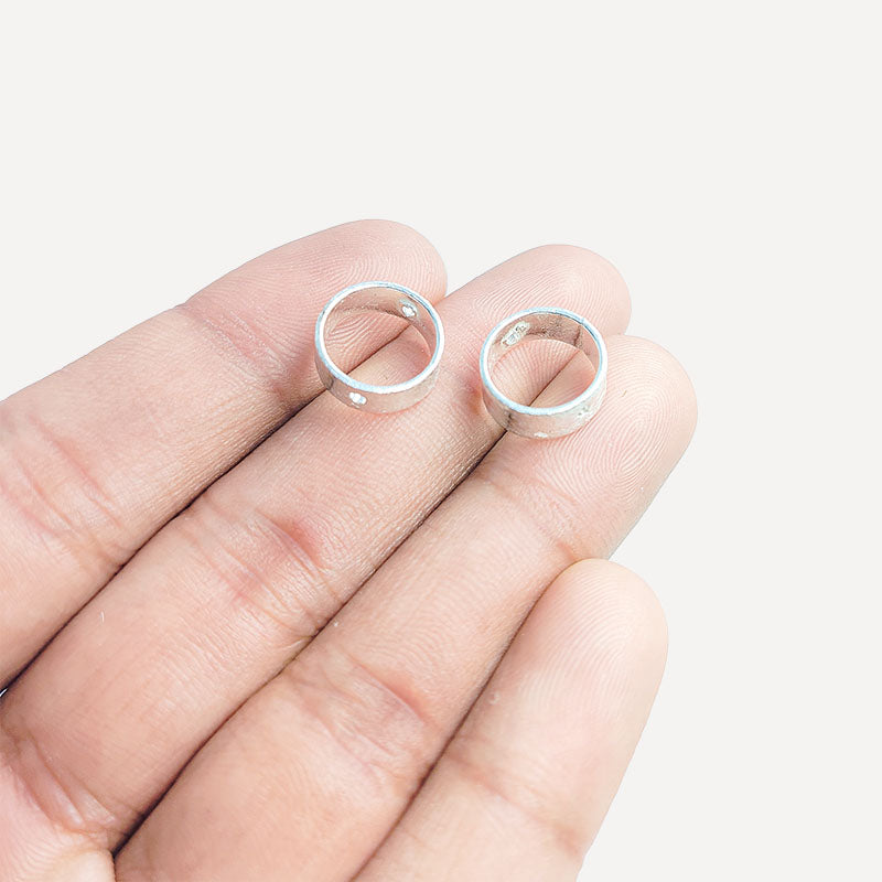 Modern wide band silver overlay over copper ring with subtle center detail and handcrafted finish made in India