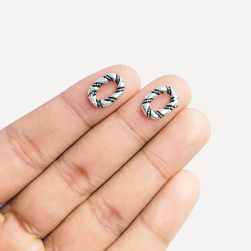 Barrel-style artisan ring finding with silver overlay over copper and oxidized accents, handmade in India