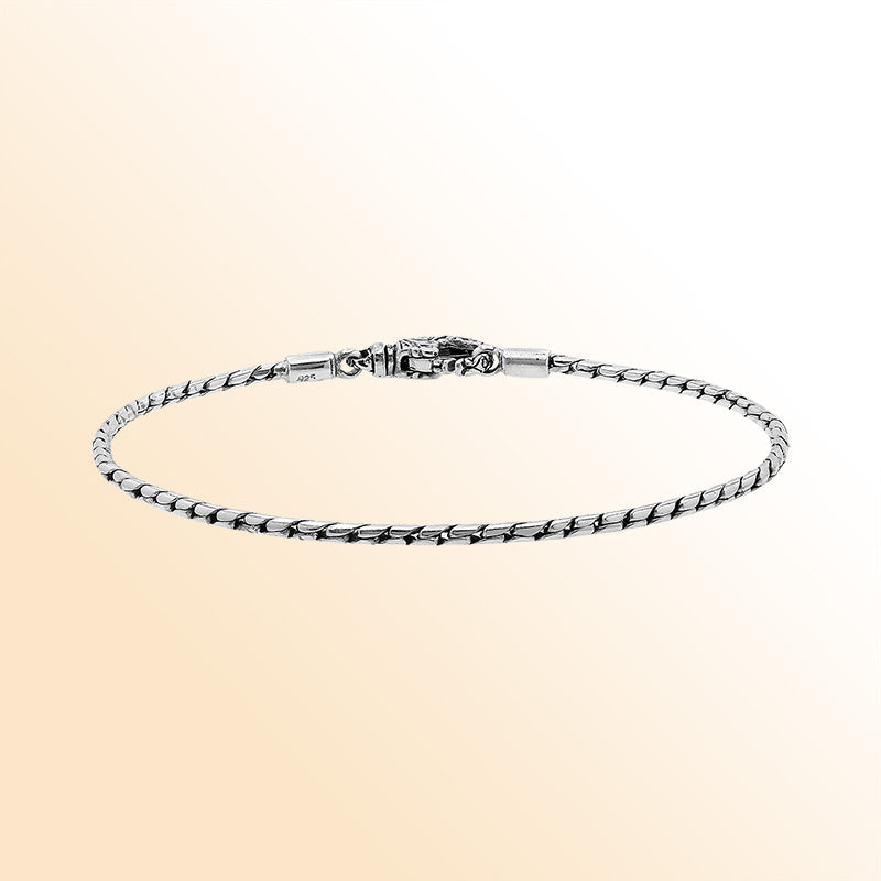 Handcrafted Sterling Silver Bali Slim Snake Chain Bracelet With Reflective Finish And Lobster Clasp.