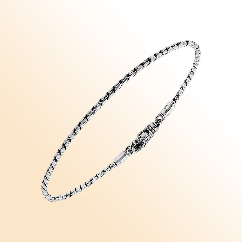 Handcrafted Sterling Silver Bali Slim Snake Chain Bracelet With Reflective Finish And Lobster Clasp.