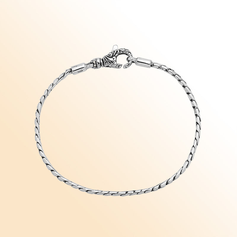 Handcrafted sterling silver Bali rope-link bracelet with polished finish and handmade hook clasp.