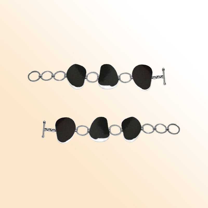 Sterling Silver Bracelet With Organic Black Shell And Textured Links