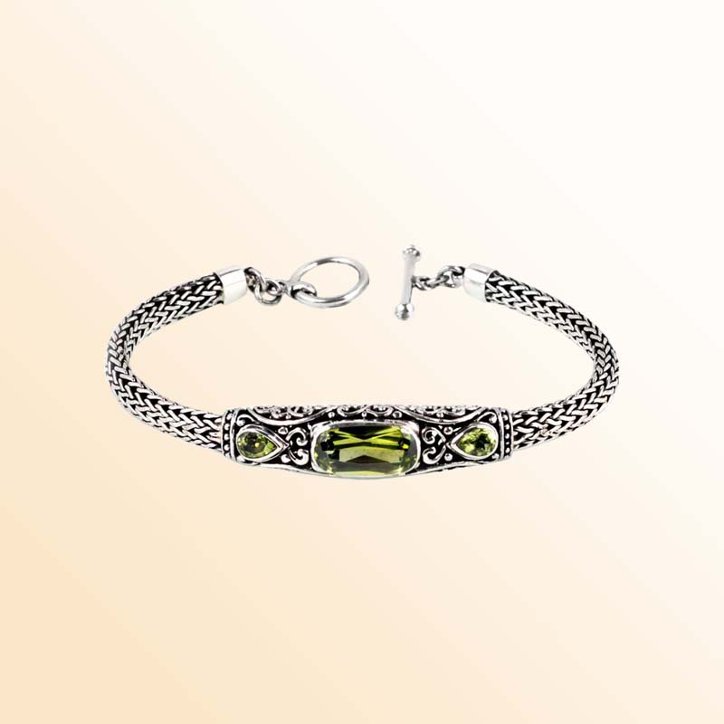 Sterling Silver Bracelet With Peridot Quartz Center-Bar And Bali Carved Accents