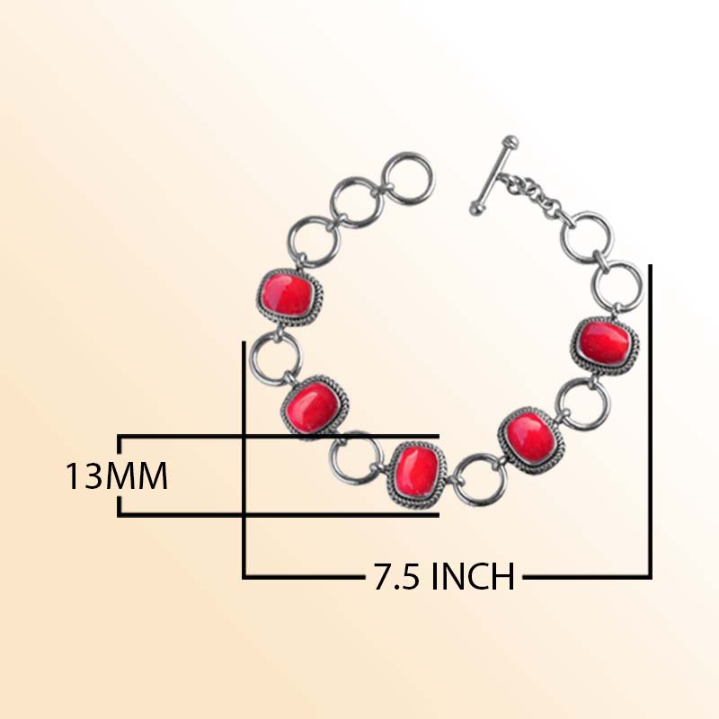 Handcrafted Sterling Silver Bracelet Featuring Red Coral Cushion Stones In Rope Bezels And Large Rings