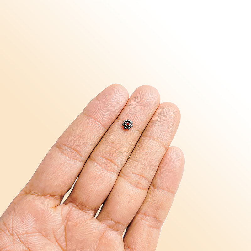 Handcrafted black rhodium overlay raised petal floral copper spacer bead from India for modern jewelry designs