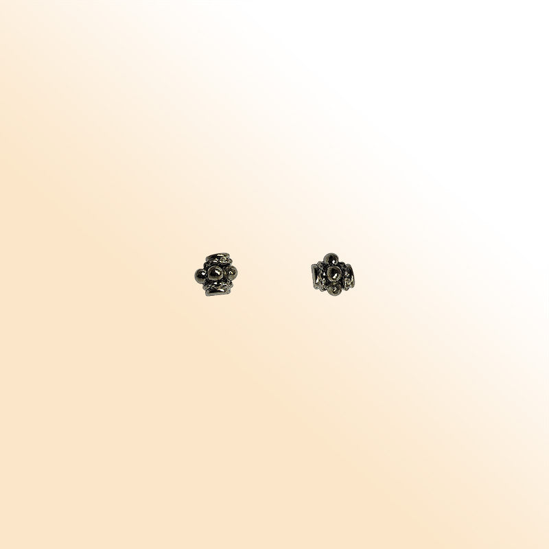 Handcrafted black rhodium overlay floral copper spacer bead from India for modern jewelry designs